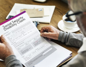 person reading social security disability claim