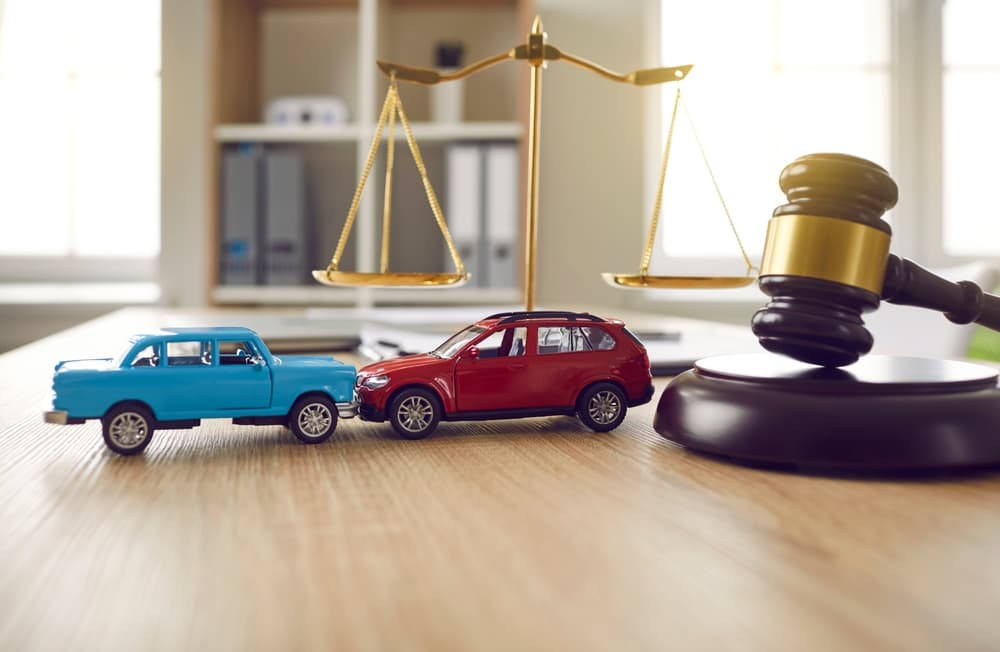 two small cars on table courtroom