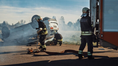 Firefighters and rescue team at a catastrophic crash scene