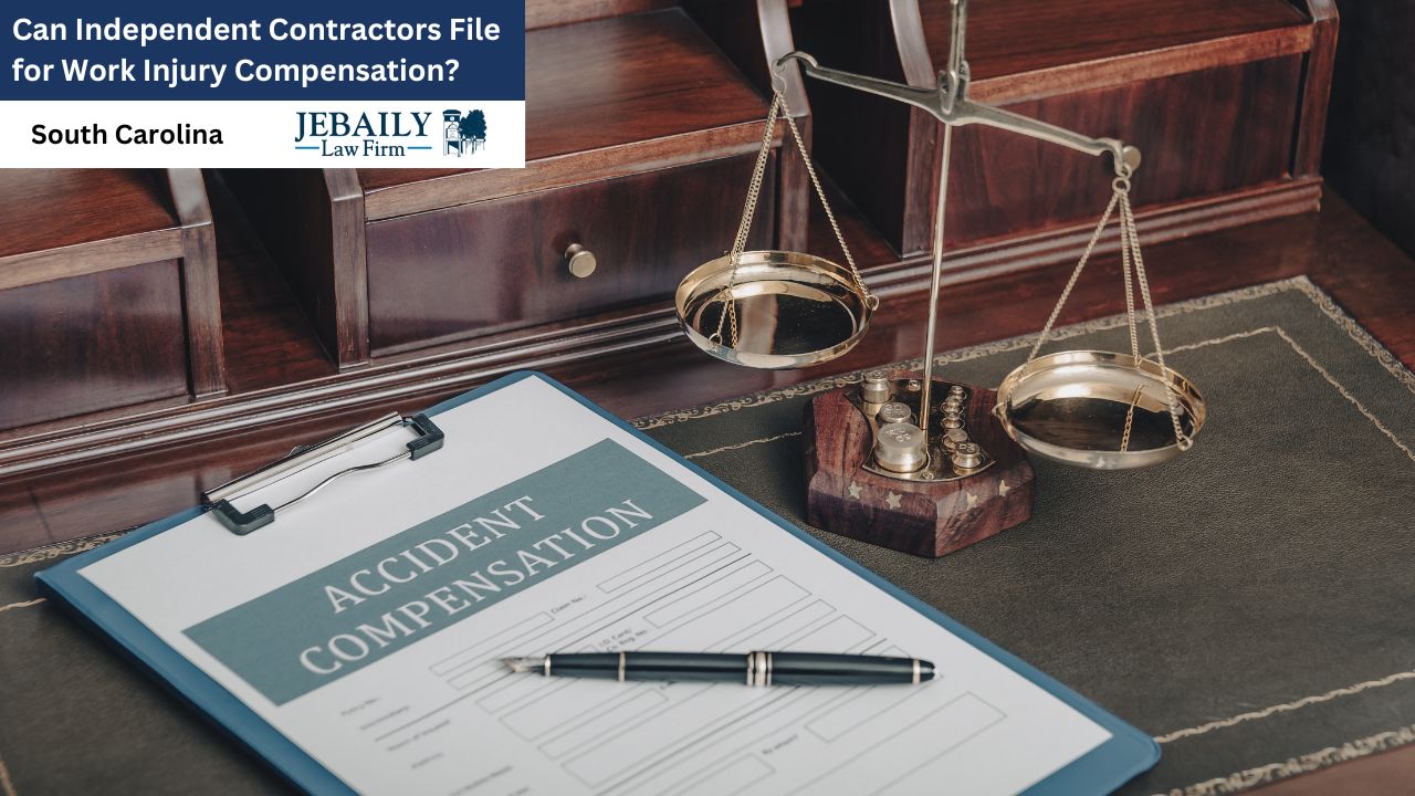 An accident compensation form rests on a dark wooden desk alongside a brass scale, suggesting a legal context related to work injury claims for independent contractors in South Carolina.