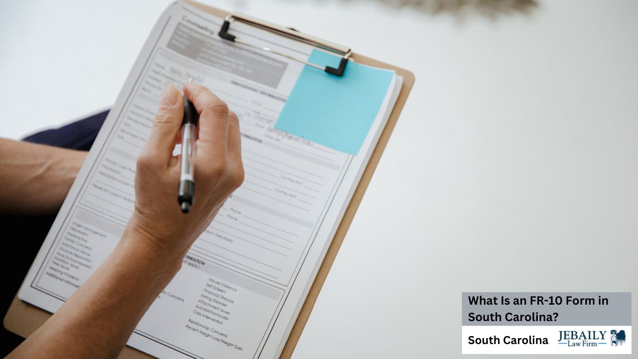 A person is filling out a counseling form on a clipboard, with a focus on the hand holding a pen and the form details.