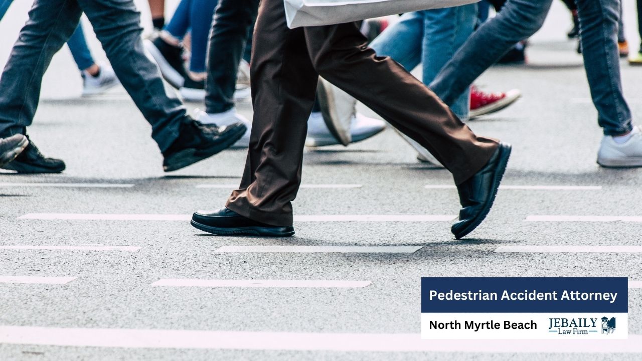 The image depicts a group of pedestrians crossing a street, overlaid with a commercial advertisement for a pedestrian accident attorney.