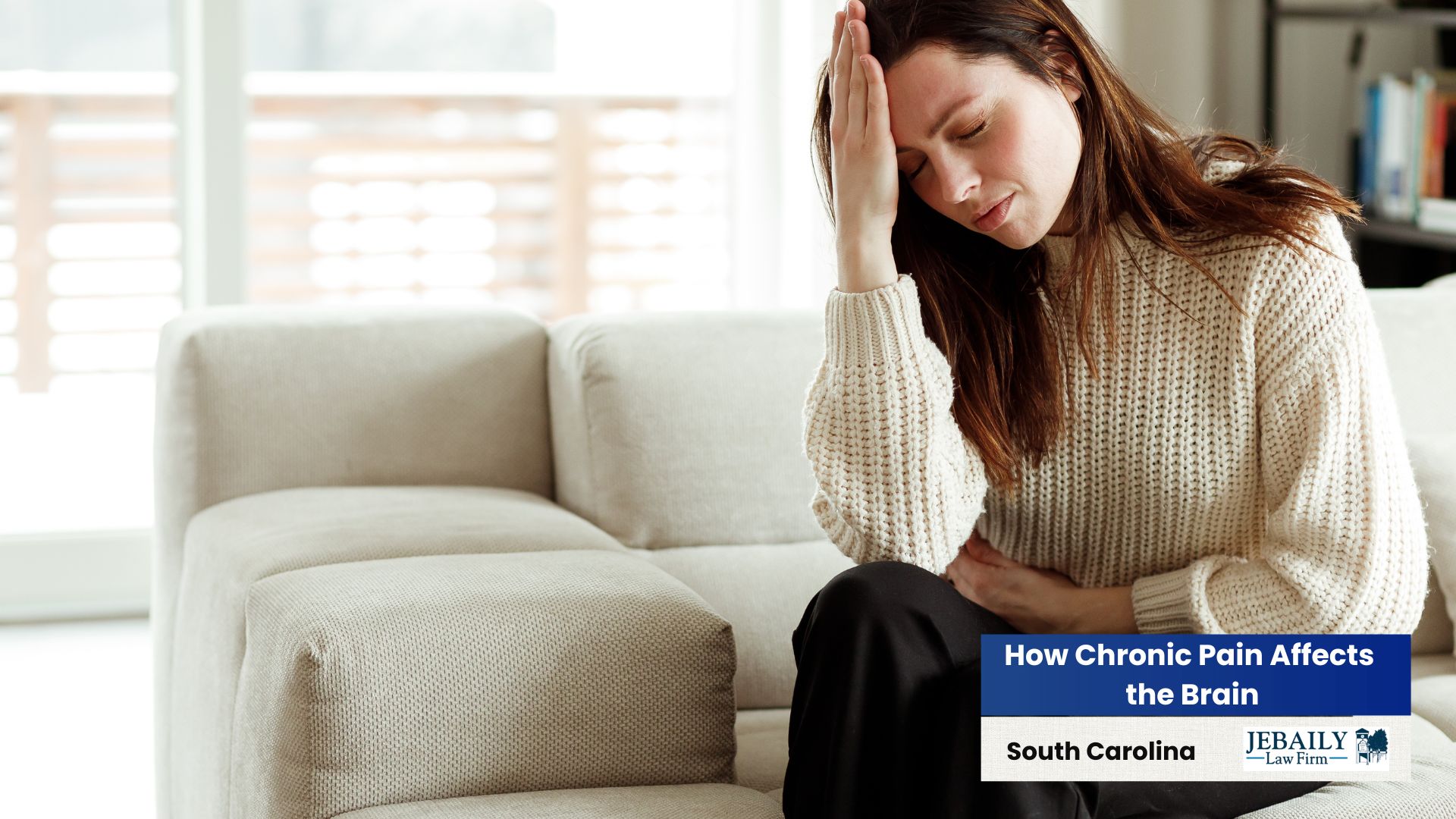 Woman holding her head form chronic pain in her brain